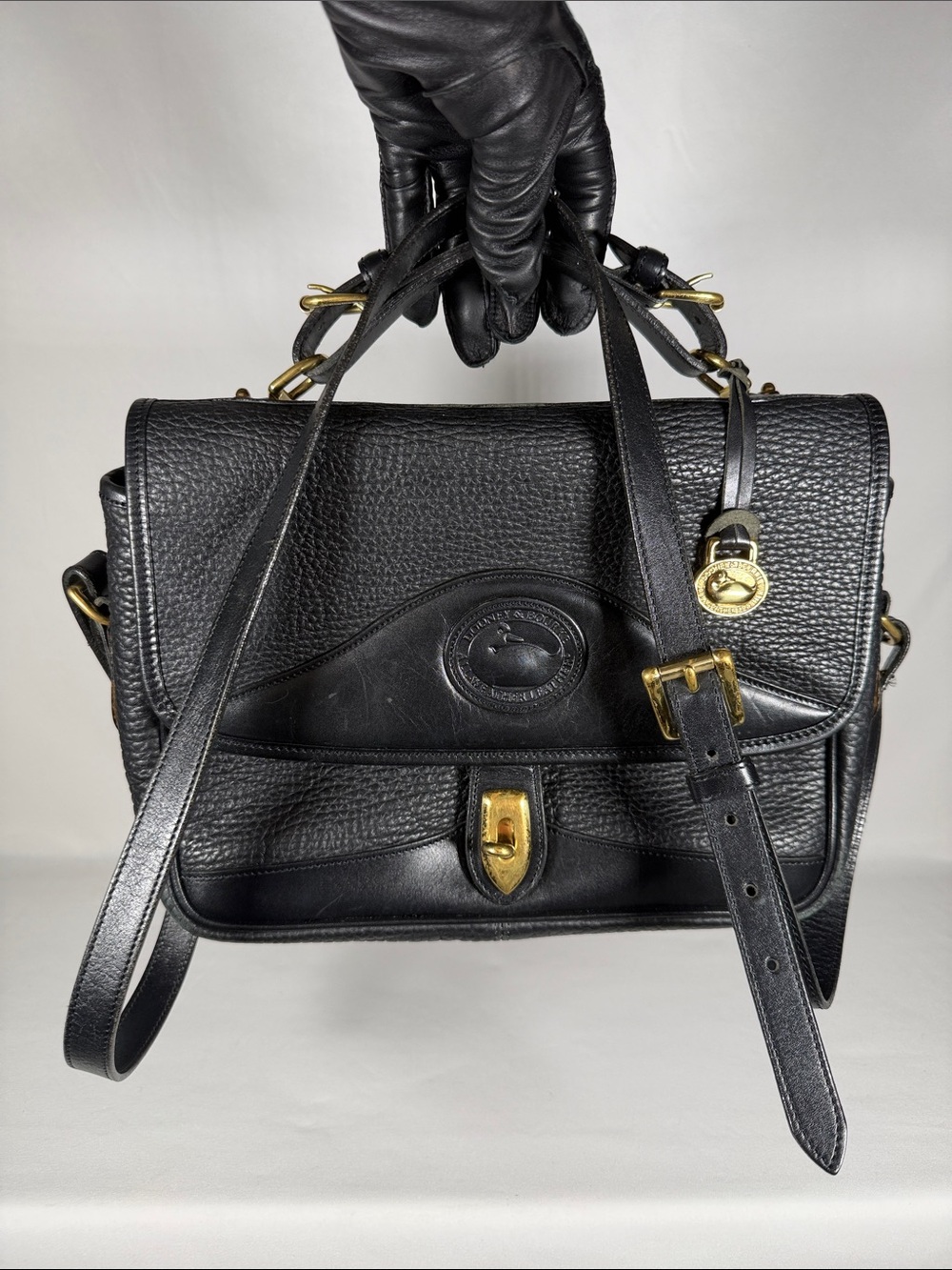Dooney & Bourke All Weather Black Pebbled Leather Carrier